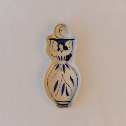 Handmade ceramic incense holder shaped as a woman carrying the moon