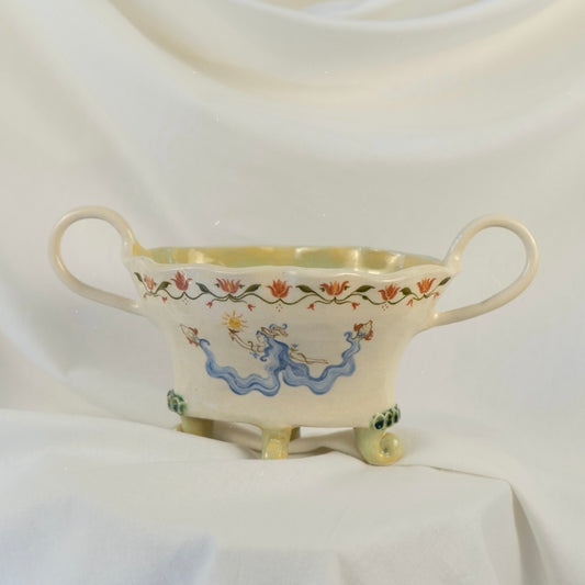 Smyrna, a one-of-a-kind handmade sculptural stoneware ceramic vessel featuring a feminine figure, flowing blue skirt, and hand-painted mythological motifs by Ruka Ceramics.